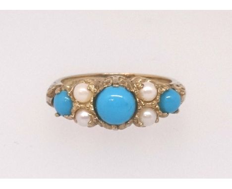 A 9ct turquoise and pearl seven stone ring, finger size N.