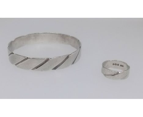 Steven Behrens, a contemporary design silver bangle and band ring (2).