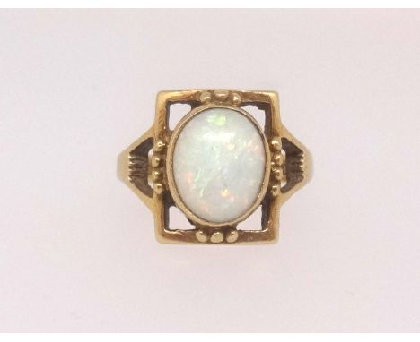 An 18ct opal set ring, finger size K.