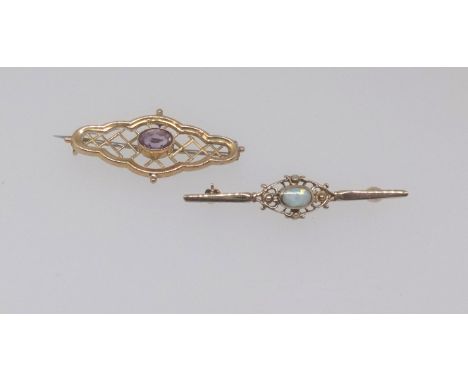 A 9ct yellow gold and opal set brooch together with another 9ct and amethyst set brooch (2)