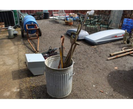 A galvanised bin and contents of various long handled garden tools 