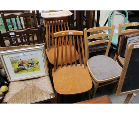 Two Ercol style stick back chairs