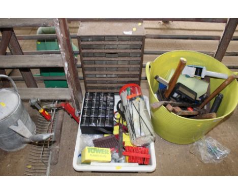 A trug containing various hand tools, a multi drawer chest and various fittings and a plastic tray of various fittings