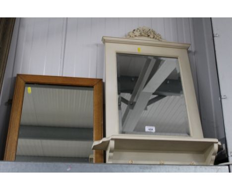 A cream painted bevel edge mirror and a light oak framed wall mirror