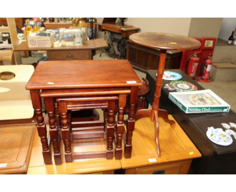 A nest of three occasional tables and a wine table on tripod base