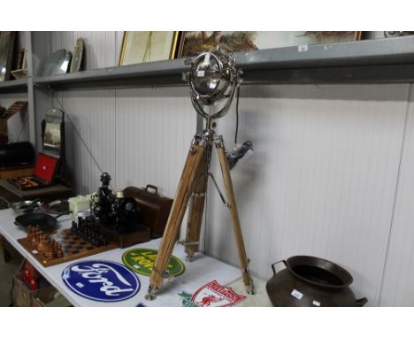A spotlight on adjustable tripod
