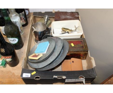 A box of various metal ware to include candle sticks, tea caddy, various coinage, costume jewellery, silver plated tankard et