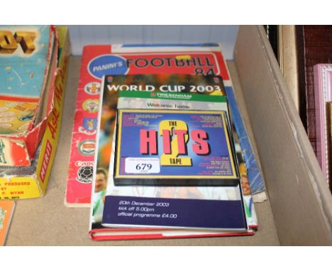 A football sticker album; cassette tape; England rugby program and England rugby World cup 2003 book and ticket stub