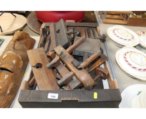 A box of moulding planes and other wood working tools