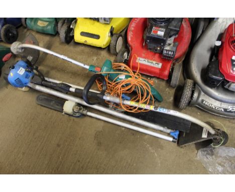 A Silver Line strimmer with hedge cutter attachment and chainsaw attachment