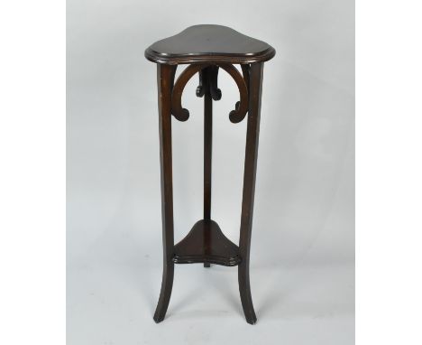 A Mahogany Torchere Stand with Stretcher Shelf, 93cms High