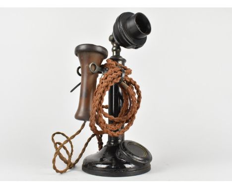 An Early/Mid 20th Century Black Bakelite Painted Candlestick Telephone, Numbered 150 and 1'2 234, 30cms High