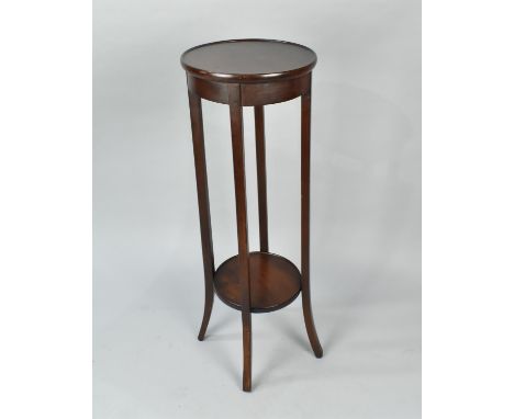 A Mahogany Torchere Stand with Stretcher Shelf, 93.5cms High