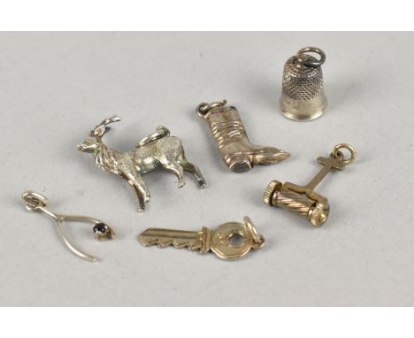A Small Collection of Various Silver and White Metal Charms to include Stag, Thimble, Boot, key, Lawn Mower Etc
