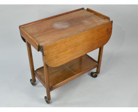 An Early/Mid 20th Century Drop Leaf Trolley on Castor Supports with Stretcher Shelf
