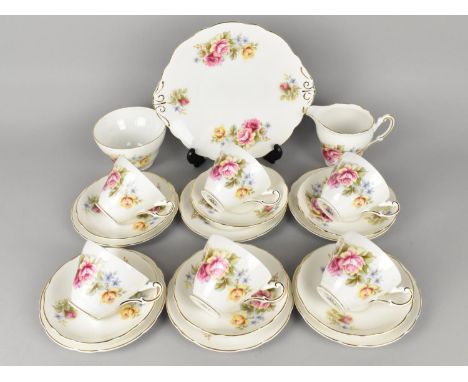 A Regency China Floral Decorated Tea Set for Six to Comprise Cups, Saucers, Side Plates, Cake Plate, Milk Jug and Sugar Bowl
