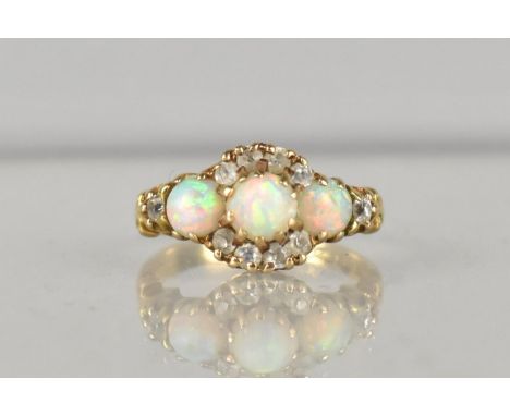 A Victorian 18ct Gold, Opal and Diamond Ladies Ring, Circular Cabochon Centre Opal Measuring 4.9mm Held in Ten Elongated Pron