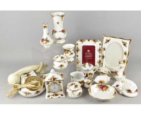 A Collection of Royal Albert Old Country Roses to Comprise Telephone, Mantle Clock, Cat, Photo Frames, Vases etc