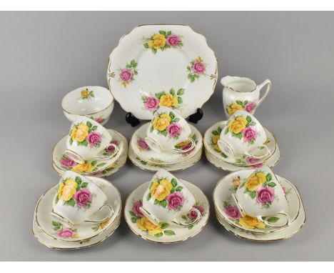 A Diamond China Rose Decorated Tea Set to Comprise Six Cups, Six Saucers, Five Side Plates, Milk Jug, Sugar Bowl and a Cake P