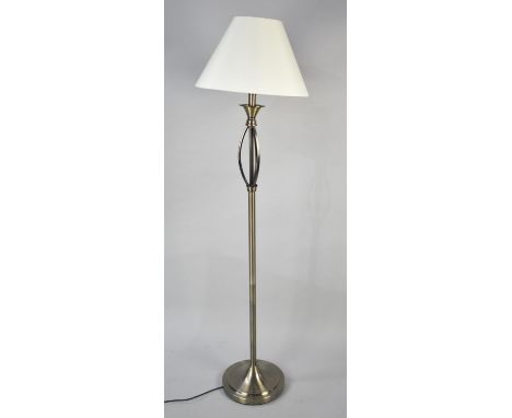 A Modern Brushed Metal Lamp