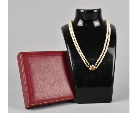 A Nice Quality Two Row String of Pearls, Largest 7.5mm Wide on a 9ct Gold, Pearl and Amethyst Mounted Push Clasp Missing Two 