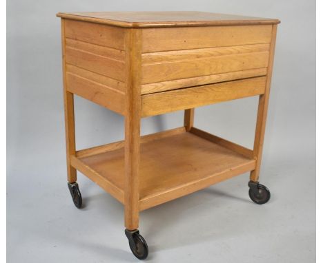 A Mid Century Sewing table with Hinged Top Store to Single Drawer and Open Shelf Under, On Castors, 57x39x52cms High