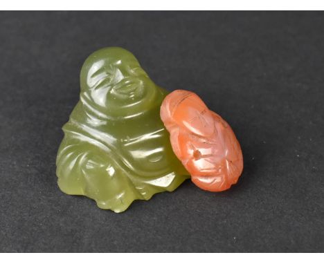 A Carved Jade Effect Buddha and Carnelian Pendant, Buddha 3.5cms High