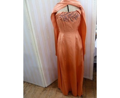 Phyllis Taylor apricot satin full length evening gown with embroidered bodice, with sash detail, a Nora Bradley vintage eveni