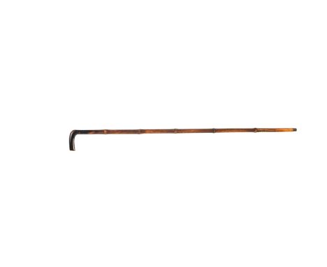 A 5.5mm walking-stick gunBamboo sleeved, the barrel with ferrule plugWeight 1lb. 1oz., 25in. barrelThis lot is subject to the