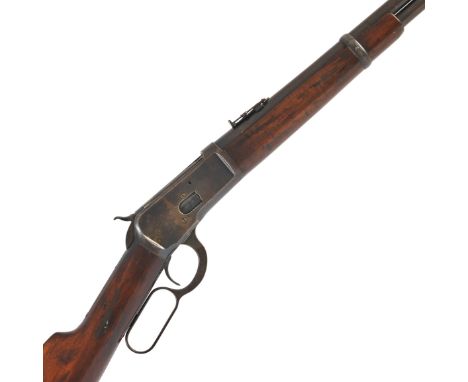 A .44 (W.C.F.) 'Model 1892' saddle-ring carbine by Winchester, no. 757413Plain blued receiver, ring and staple, the top-tang 