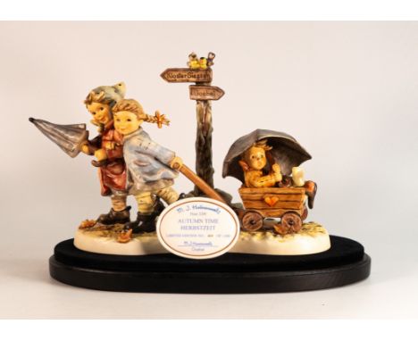 Boxed Goebel M J Hummel figure Autumn Time 2200 on wooden plinth with limited edition plaque, height 17cm 