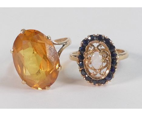 Two 9ct gold hallmarked rings - large topaz (or similar stone) set ring, size N, together with an opal &amp; sapphire cluster