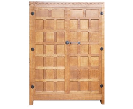 Robert 'Mouseman' Thompson (Kilburn), English Oak two door wardrobe, double panelled doors with half penny moulding carved to