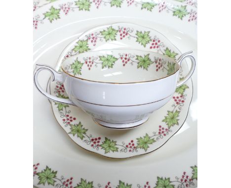 A large collection of Royal Albert dinner ware decorated with ivy leaves and red berries to include - 2 lidded tureens, 12 sa