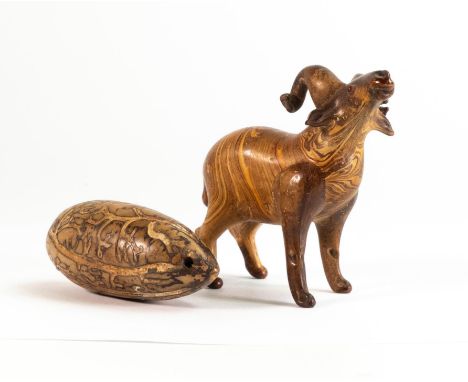 South East Asian stone figure of a ram together with a Japanese Netsuke made from a nut/seed 