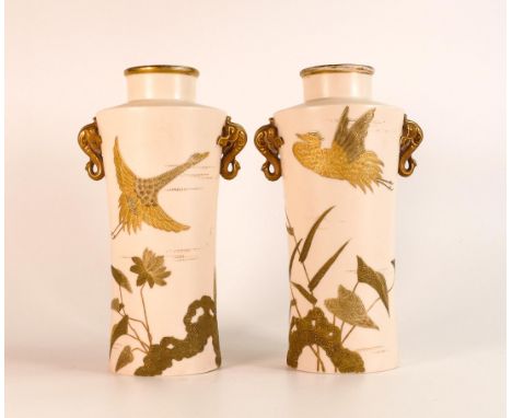 Pair of Royal Worcester Aesthetic Movement raised gilt Japaned vases with crane &amp; foliage decoration, stylised elephant h