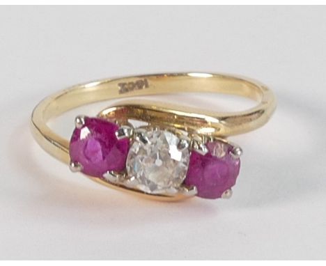 18ct gold ruby &amp; diamond three stone ring, set with two round brilliant cut rubies each 4.4mm x 4.4mm x 3.4mm each approx