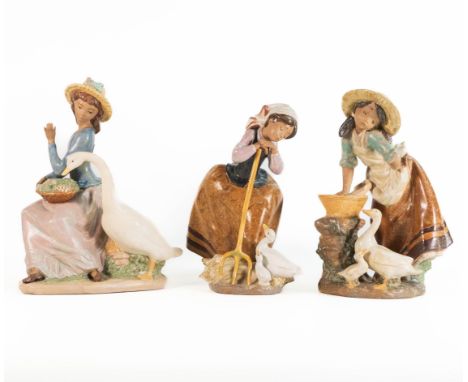 Three boxed Lladro Gres figures to include Harvest Helpers 2178, Laundry Day 2216, Goose Trying To Eat 2312 (3) 