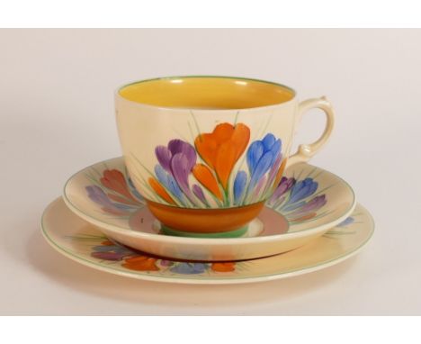 Clarice Cliff Royal Staffordshire trio decorated in the Crocus design. (3) 