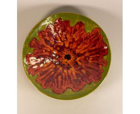 Lise B. Moorcroft for Poole Pottery cast charger, 2000 with vibrant poppy on lime decoration, diameter 40.5cm 