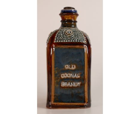 Doulton Lambeth Brandy flask of four sided single handle mottled in blue and brown with embossed description "Old Cognac Bran