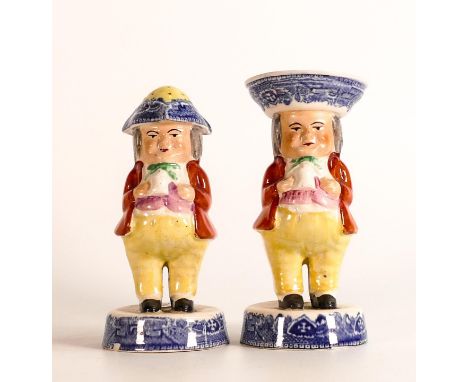 A pair of Staffordshire Toby cruet figures - including one salt cellar and a sifter / muffineer with old willow transfer prin