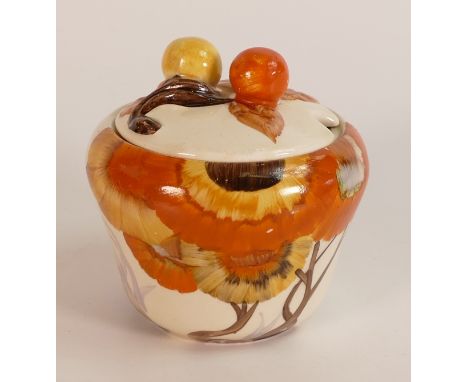 Clarice Cliff, Mustard Pot in the 'Rhodanthe' pattern, hand painted in brown and orange shades depicting stylised tree landsc