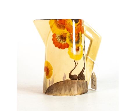 Clarice Cliff, V-handled jug in the 'Rhodanthe' pattern, hand painted in brown and orange shades depicting a stylised tree la