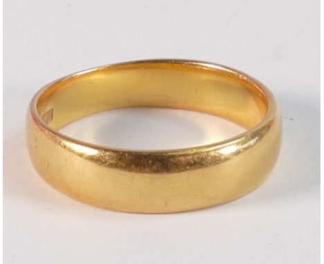 22ct gold hallmarked wedding ring / band, size just under R, weight 6.17g. 