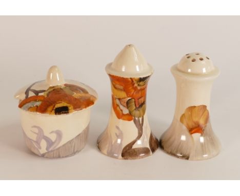 Clarice Cliff, cruet set in the 'Rhodanthe' pattern, hand painted in brown and orange shades depicting stylised tree landscap