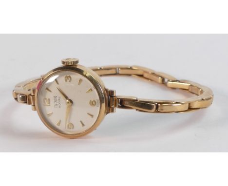 Ladies Tudor Rolex 9ct gold wrist watch and 9ct gold hallmarked Rolex bracelet, not working. Measures 20mm wide inc. button, 