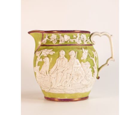 Early 19th century Pearlware jug with relief moulded hunting scenes. The body painted in a bright overglaze enamel green high