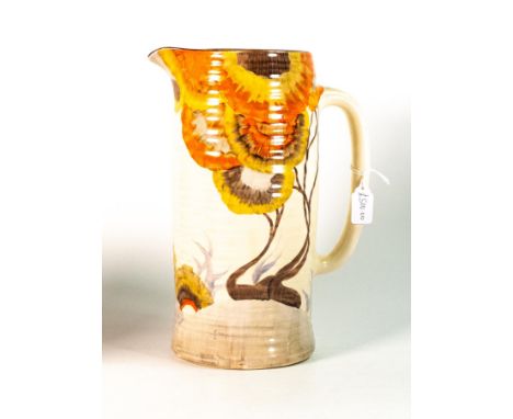 Clarice Cliff, ribbed Lemonade jug in the 'Rhodanthe' pattern, hand painted brown and orange shades depicting stylised tree l