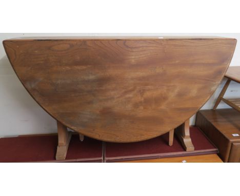 A mid 20th century elm &amp; beech Ercol 610 gate leg table Condition Report: Available upon request